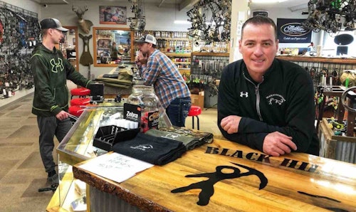 Al Kraus owns Black Hills Archery and gives his store personality with service and personalized help. (Photo by Mark Kayser.)