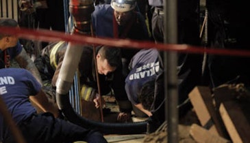 Rescue Crews Free Contractor Trapped in Sewer