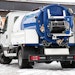 High-pressure vacuum unit maneuvers tight locations