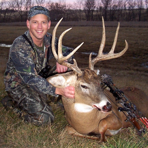 A Halloween-weekend buck from a few years ago in South Dakota. Temps were warm, and the author lured the tall-tined 4x4 within bow range by grunting while the deer was feeding on acorns. The buck wasn’t actively looking for a doe, he was still on a bedding-to-food pattern.