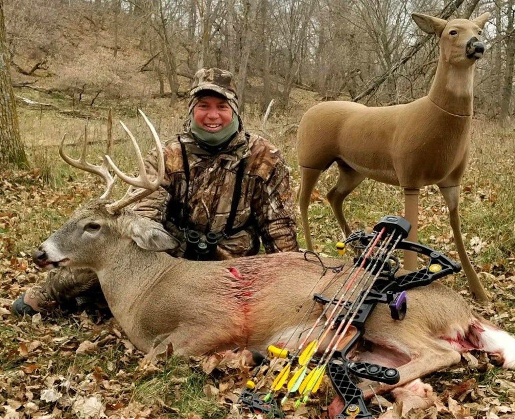 The author used a decoy to lure this South Dakota buck in close for a broadside shot. Treestand height was 14 feet; shot distance, 10 yards. See the entrance hole? It's right over the front leg. The buck ran only 50 yards.