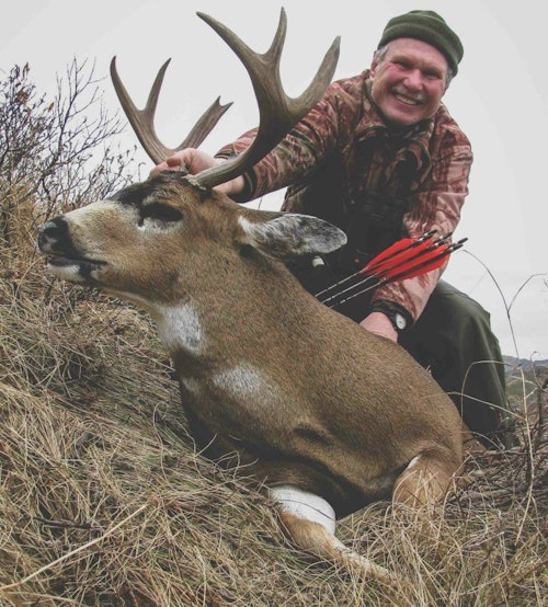 The author took this record-book buck on an October 2019 DIY Kodiak bowhunt. The animal required a steep climb and difficult meat pack back to the lakeshore camp.