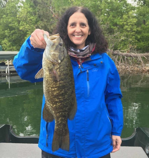 The author’s friend, Claire, caught this beautifully colored spring smallmouth on a leech in late-May 2021.