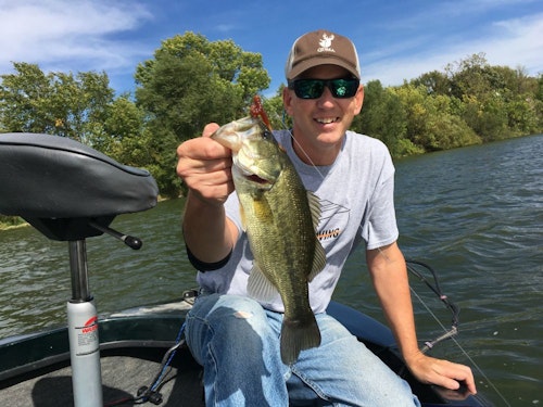 The author wearing Green Mirror lenses from Costa, which are designed specifically for inland anglers who want to sight fish and see underwater objects in fairly clear water.