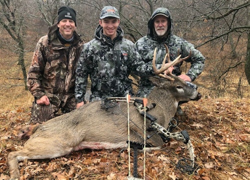 Elliott Maas (center) arrowed his first deer with a compound bow during the 2020 whitetail season. Joining him in the field was the author (left) and their friend Bill (right).