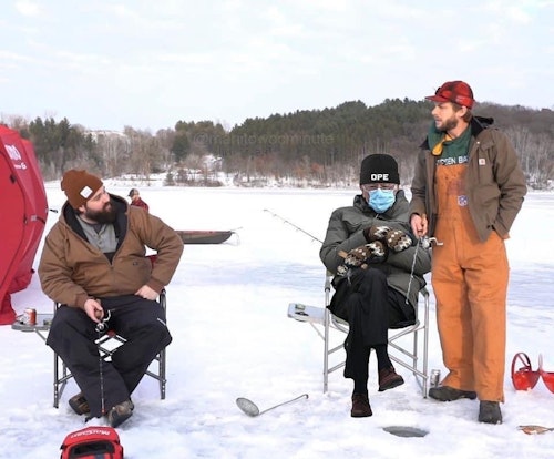 Bernie guiding a couple guys ice fishing, near Manitowoc, Wisconsin.
