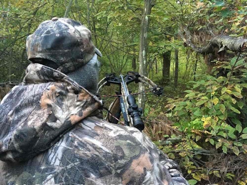 When hunting in thick cover, the author doesn’t wait until he spots a whitetail to slide a crossbow’s safety to the “fire” position because the deer could see him move or hear the safety’s metallic click.