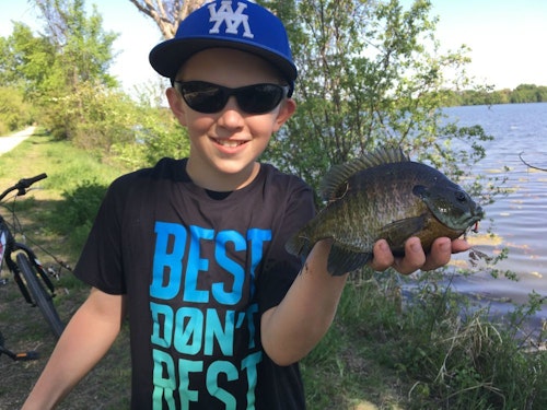 Don’t forget the kids when it comes to buying polarized fishing glasses. Kid glasses will have smaller frames and less-expensive frames and lenses. As shown here, glasses should be worn by anglers no matter whether you’re in a boat or fishing from shore.