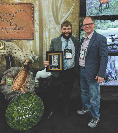 Bowhunting World’s Pat Boyle (right) presents the Reader’s Choice Gold Award to Rinehart Owner and President James McGovern.