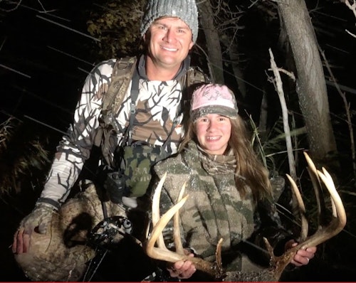 Sam Ellyson and his 13-year-old daughter Ella with her first bow buck.