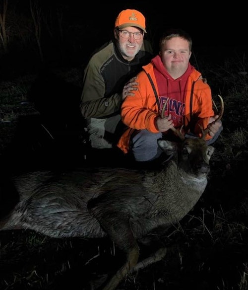 Father and son in the field. Steve and Pierce Pennaz celebrate a hunter’s first deer.