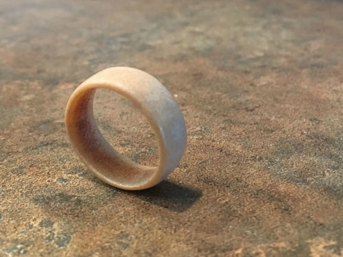 The author’s homemade pinky ring used to be much darker with a more textured exterior. He retired the weathered antler ring in 2000 after wearing it nearly 20 years.