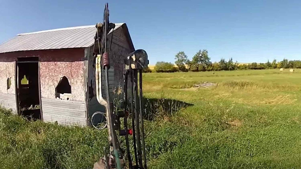 Crazy Video: Bowhunter Stalks Mule Deer Buck That’s Holed Up in a Barn