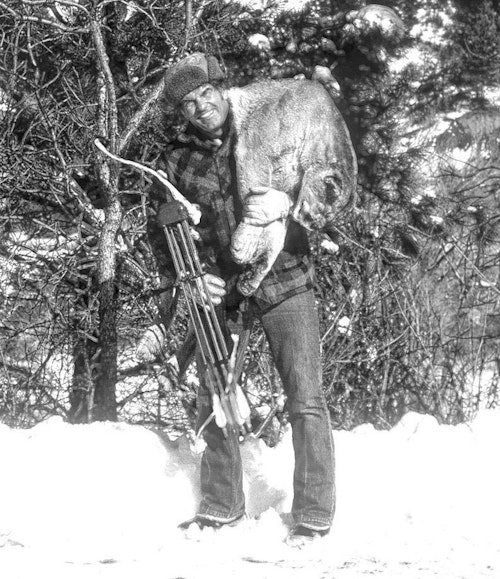The author with a big bow-killed mountain lion.