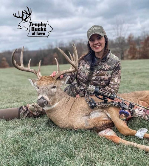 Aspen Bromell with an awesome buck from Van Buren County, Iowa. Bromell is sitting close behind the deer. She’s not straining to push the antlers far away from her body and toward the camera.