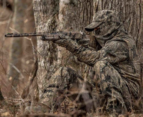 The keys to dropping a wild turkey with one shot are waiting for the bird to walk within range, knowing when to shoot and where to aim, and having a solid shooting base.