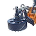 Skid-steer attachment makes manhole replacement easy
