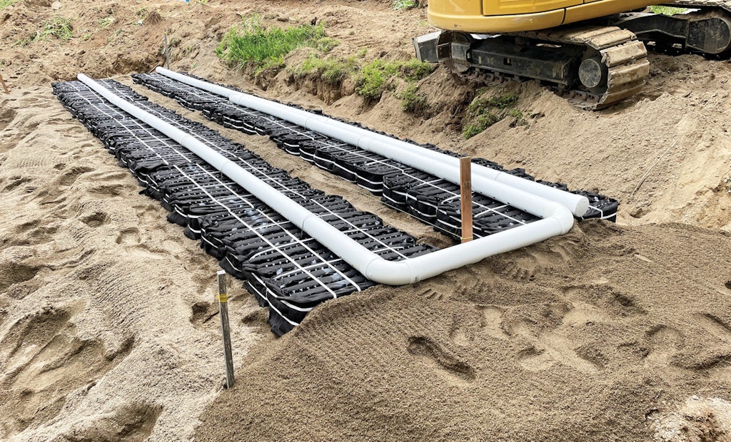 Steep Maine Hillside Requires Carving a Flat Drainfield Bed