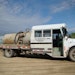 Half Vacuum Truck, Half School Bus Served Minnesota Pumper Well
