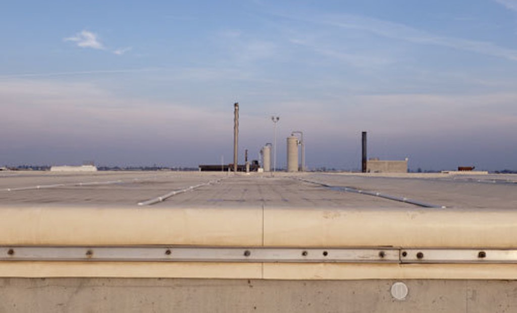 Celebrating Efficiency: Gas Collecting Cover Helps Fuel Plant
